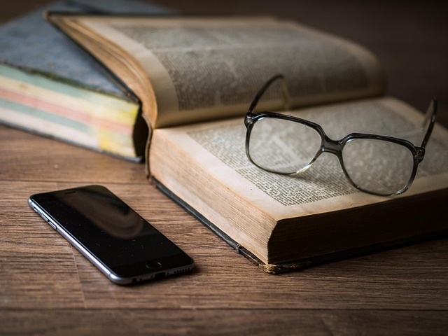 Open book with glasses for name study